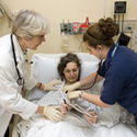 Patient in bed :: Columbia University: School of Nursing
