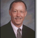 College president F James Cummins :: Baker College of Flint